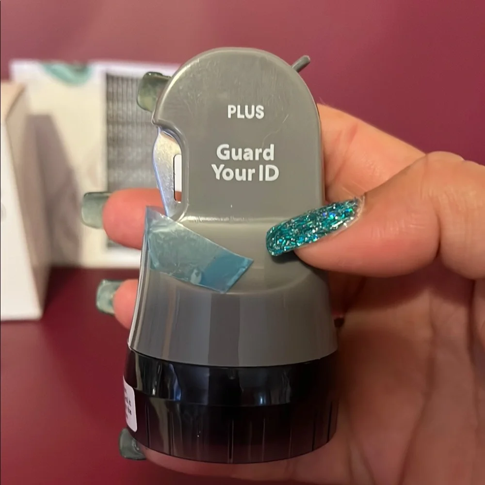 PLUS Guard Your ID Roller Stamp Identity Protection Letter Opener.